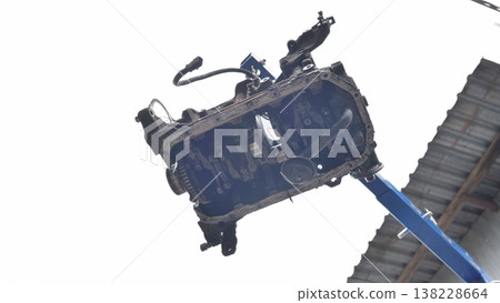 Vehicle engine block on stand during maintenance 138228664