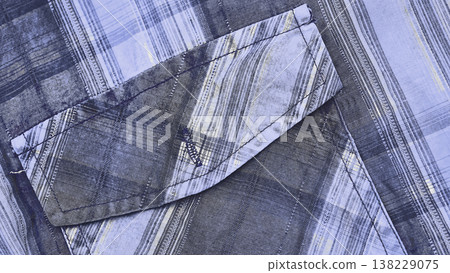 Denim pocket on blue gray shirt, hide something Denim pocket on blue gray shirt, hide something 138229075