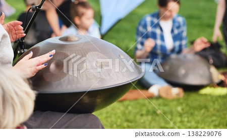 Handpan musician performing during India Day in Moscow festival Handpan musician performing during India Day in Moscow festival 138229076