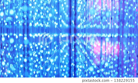 Blue bokeh lights forming blurred lines, creating an abstract digital background Blue bokeh lights forming blurred lines, creating an abstract digital background 138229155