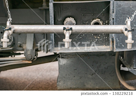 Water tank truck plumbing system distributing liquid using multiple taps 138229218