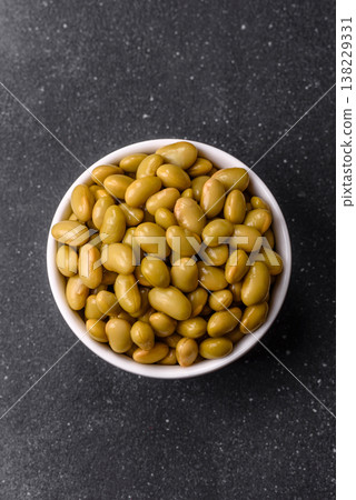 Canned green edamame beans as a healthy vegan ingredient. Edamame beans Canned green edamame beans as a healthy vegan ingredient. Edamame beans 138229331