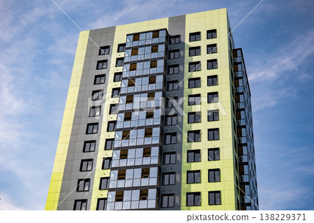 Residential building with contemporary architecture, providing housing in an urban environment Residential building with contemporary architecture, providing housing in an urban environment 138229371
