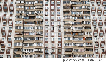 Repetitive windows and balconies defining urban residential building facade architecture Repetitive windows and balconies defining urban residential building facade architecture 138229378