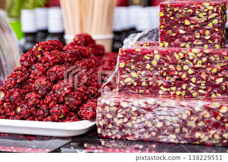 Turkish delight with pistachio and pomegranate, traditional Middle Eastern treats Turkish delight with pistachio and pomegranate, traditional Middle Eastern treats 138229551