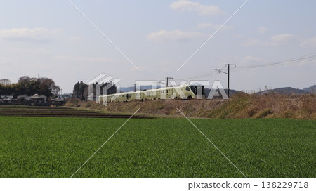The Shiki-shima train runs through a rural landscape on the Mito Line in Sakuragawa City. The Shiki-shima train runs through a rural landscape on the Mito Line in Sakuragawa City. 138229718