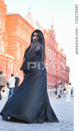 Woman standing on Red Square, exploring Moscow and enjoying a cultural travel experience Woman standing on Red Square, exploring Moscow and enjoying a cultural travel experience 138229885