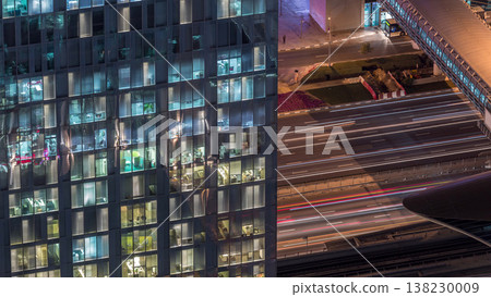 Night view of exterior apartment tower timelapse. High rise skyscraper with blinking lights in windows Night view of exterior apartment tower timelapse. High rise skyscraper with blinking lights in windows 138230009