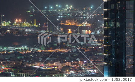 Aerial view from Downtown of Dubai to port night timelapse Aerial view from Downtown of Dubai to port night timelapse 138230017