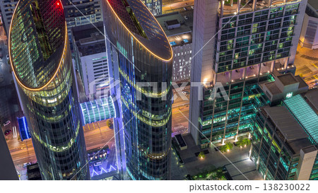 Skyline of the buildings of Sheikh Zayed Road and DIFC aerial night timelapse in Dubai, UAE. Skyline of the buildings of Sheikh Zayed Road and DIFC aerial night timelapse in Dubai, UAE. 138230022