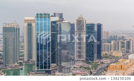 Jumeirah Lake Towers residential district aerial timelapse near Dubai Marina Jumeirah Lake Towers residential district aerial timelapse near Dubai Marina 138230100