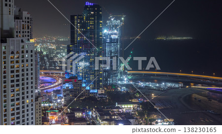 Waterfront overview Jumeirah Beach Residence JBR skyline aerial night timelapse 138230165