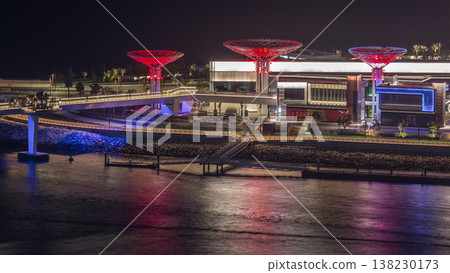 Bluewaters Island in Dubai aerial night timelapse with illuminated buildings. Bluewaters Island in Dubai aerial night timelapse with illuminated buildings. 138230173