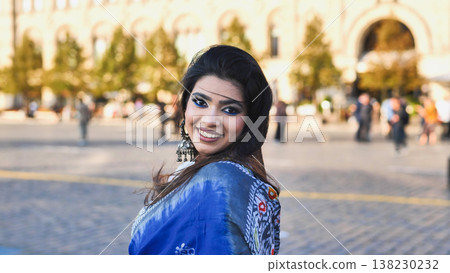 Young Indian woman wearing sari in Moscow city 138230232