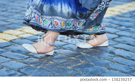 Young Indian woman walking Moscow street traditional Indian fashion 138230257