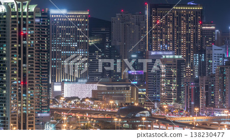 Dubai Marina skyscrapers and golf course night timelapse, Dubai, United Arab Emirates Dubai Marina skyscrapers and golf course night timelapse, Dubai, United Arab Emirates 138230477