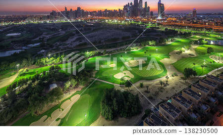 Dubai Marina skyscrapers and golf course day to night timelapse, Dubai, United Arab Emirates Dubai Marina skyscrapers and golf course day to night timelapse, Dubai, United Arab Emirates 138230500