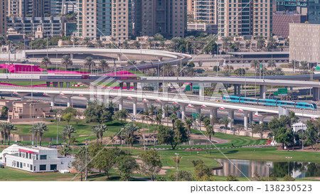 Dubai Marina skyscrapers and golf course morning timelapse, Dubai, United Arab Emirates Dubai Marina skyscrapers and golf course morning timelapse, Dubai, United Arab Emirates 138230523