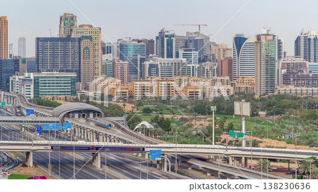 Dubai Golf Course with a cityscape of Greens and tecom districts at the background aerial timelapse 138230636