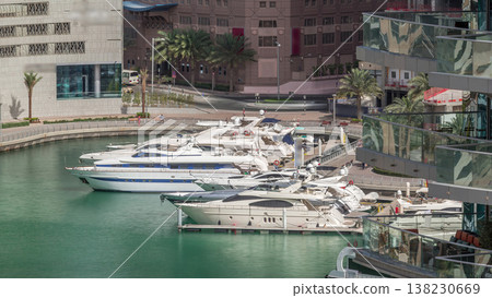 Waterfront promenade in Dubai Marina aerial timelapse. Dubai, United Arab Emirates 138230669