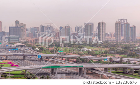 Dubai Golf Course with a cityscape of Greens and tecom districts at the background aerial timelapse 138230670