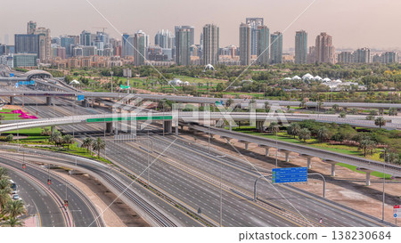 Dubai Golf Course with a cityscape of Greens and tecom districts at the background aerial timelapse Dubai Golf Course with a cityscape of Greens and tecom districts at the background aerial timelapse 138230684