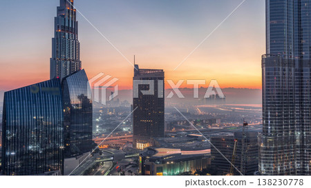Dubai downtown street with busy traffic and skyscrapers around timelapse. Dubai downtown street with busy traffic and skyscrapers around timelapse. 138230778