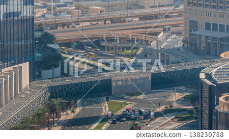 View of intersection with many transports in traffic Timelapse Aerial View of intersection with many transports in traffic Timelapse Aerial 138230788