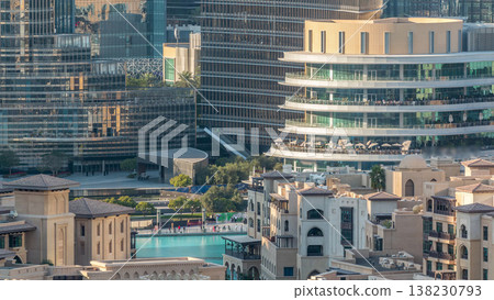 Famous musical fountain in Dubai with skyscrapers in the background aerial timelapse Famous musical fountain in Dubai with skyscrapers in the background aerial timelapse 138230793