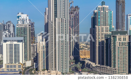 Beautiful skyline of Dubai downtown and Business bay with modern architecture. Beautiful skyline of Dubai downtown and Business bay with modern architecture. 138230858