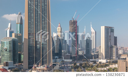 Aerial view on downtown and financial district in Dubai timelapse, United Arab Emirates with skyscrapers and highways. Aerial view on downtown and financial district in Dubai timelapse, United Arab Emirates with skyscrapers and highways. 138230871