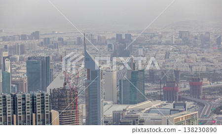 Downtown of Dubai in the morning timelapse after sunrise. Aerial view with towers and skyscrapers Downtown of Dubai in the morning timelapse after sunrise. Aerial view with towers and skyscrapers 138230890
