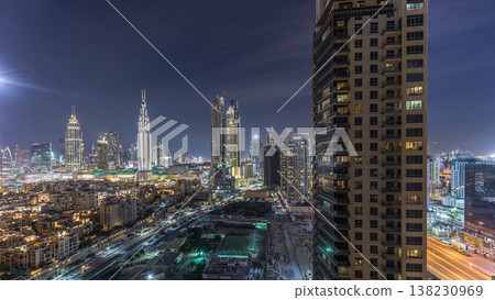 Beautiful skyline of Dubai downtown and Business bay with modern architecture night timelapse. Beautiful skyline of Dubai downtown and Business bay with modern architecture night timelapse. 138230969