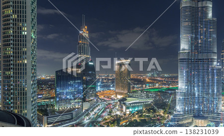 Amazing aerial view of Dubai downtown skyscrapers night timelapse, Dubai, United Arab Emirates Amazing aerial view of Dubai downtown skyscrapers night timelapse, Dubai, United Arab Emirates 138231039