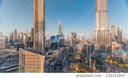 Panoramic skyline view of Dubai downtown with mall, fountains and skyscrapers aerial timelapse Panoramic skyline view of Dubai downtown with mall, fountains and skyscrapers aerial timelapse 138231047