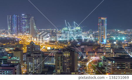 View of the rhythm illuminated city with skyscrapers in Dubai aerial timelapse 138231069