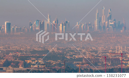 Dubai Marina and Jumeirah beach during sunrise with early morning fog timelapse in Dubai, United Arab Emirates Dubai Marina and Jumeirah beach during sunrise with early morning fog timelapse in Dubai, United Arab Emirates 138231077