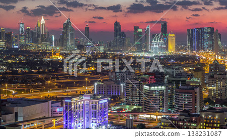 View of transition from day to night in Dubai city, United Arab Emirates Timelapse Aerial 138231087