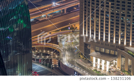 Dubai downtown street with busy traffic and skyscrapers around timelapse. Dubai downtown street with busy traffic and skyscrapers around timelapse. 138231106