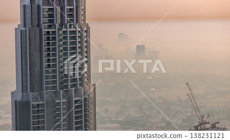 Aerial view of neighborhood Zabeel and Dubai creek with typical old and modern buildings morning timelapse. 138231121