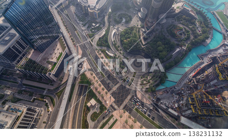 Dubai downtown street with busy traffic and skyscrapers around timelapse. Dubai downtown street with busy traffic and skyscrapers around timelapse. 138231132