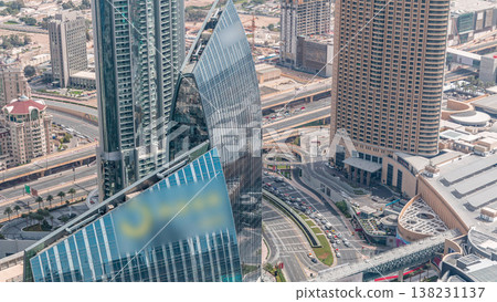 Dubai downtown street with busy traffic and skyscrapers around timelapse. Dubai downtown street with busy traffic and skyscrapers around timelapse. 138231137