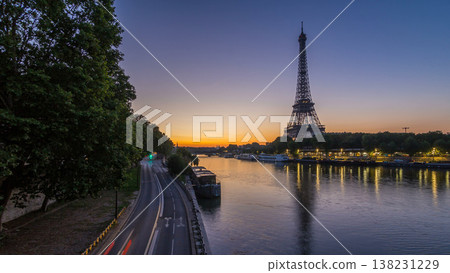 Eiffel Tower and the Seine river night to day timelapse, Paris, France Eiffel Tower and the Seine river night to day timelapse, Paris, France 138231229
