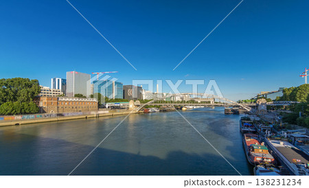 The Austerlitz viaduct in Paris timelapse hyperlapse, seen from bank of the river Seine with a metro train passing The Austerlitz viaduct in Paris timelapse hyperlapse, seen from bank of the river Seine with a metro train passing 138231234