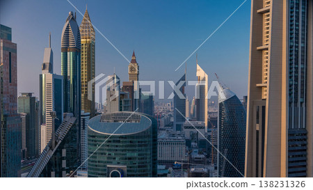 Skyline view of the buildings of Sheikh Zayed Road and DIFC timelapse in Dubai, UAE. Skyline view of the buildings of Sheikh Zayed Road and DIFC timelapse in Dubai, UAE. 138231326