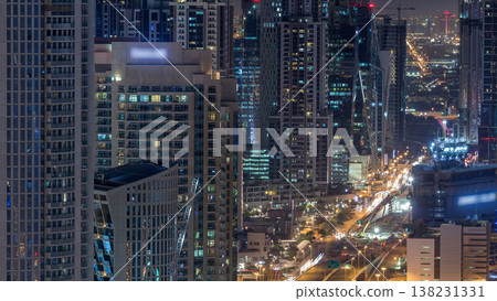Dubai Downtown night timelapse modern towers view from the top in Dubai, United Arab Emirates. 138231331