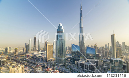 Dubai downtown skyline at sunset timelapse with tallest building and Sheikh Zayed road traffic, UAE Dubai downtown skyline at sunset timelapse with tallest building and Sheikh Zayed road traffic, UAE 138231336
