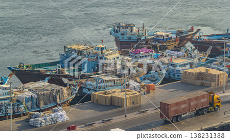 Loading a ship in Port Said timelapse in Dubai, UAE. Loading a ship in Port Said timelapse in Dubai, UAE. 138231388