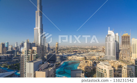 Dubai downtown in the evening timelapse in bright yellow sunset light Dubai downtown in the evening timelapse in bright yellow sunset light 138231542