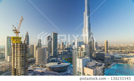 Dubai downtown in the evening timelapse in bright yellow sunset light 138231543